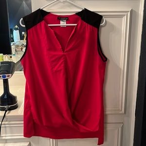 Cute hot pink and black top.  Looks great with jeans or shorts.  Worn once.